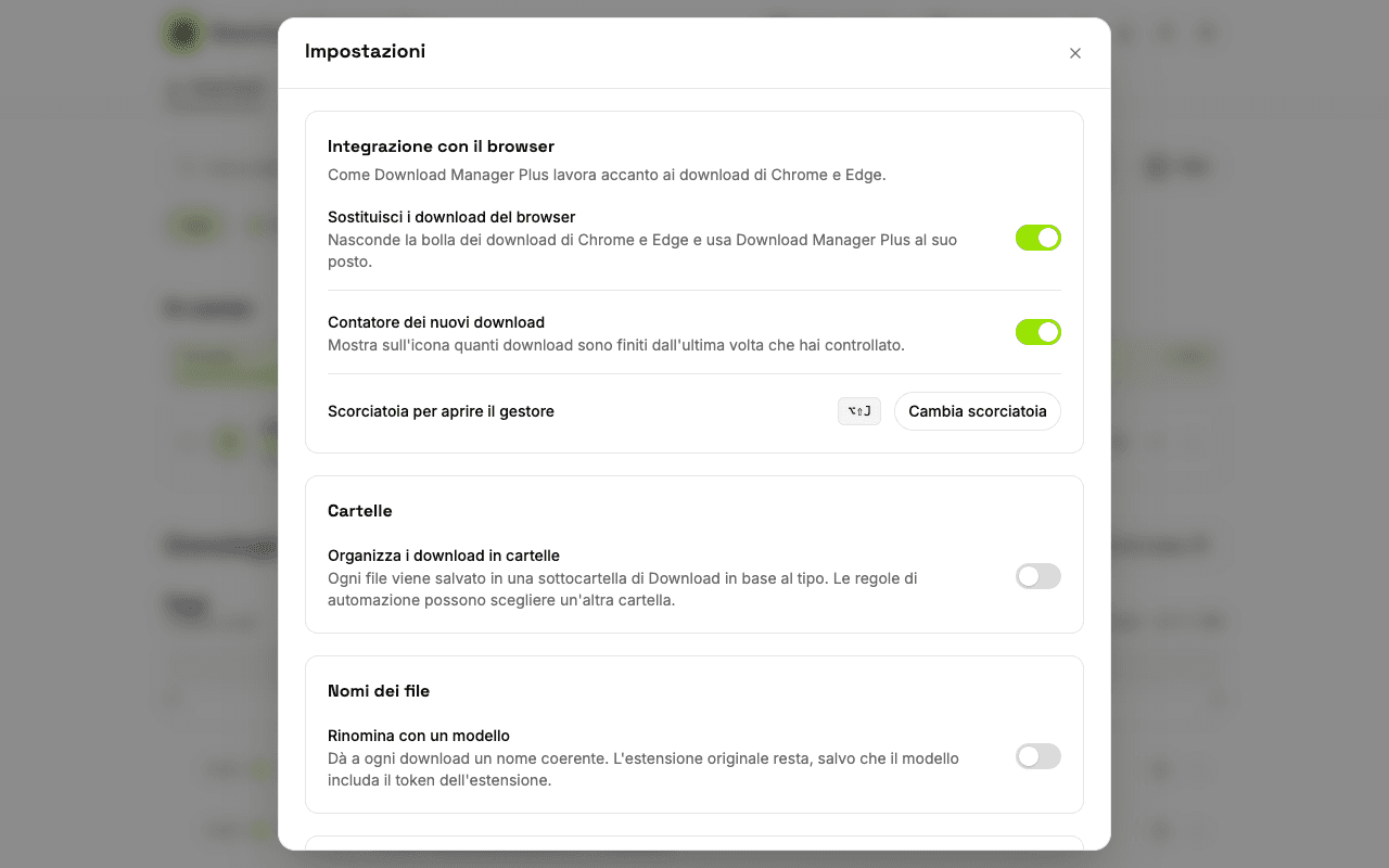 Pagina delle impostazioni di Download Manager Plus con opzioni per sostituire i download del browser, mostrare il contatore sull'icona, cambiare la scorciatoia da tastiera, impostare le notifiche e scegliere il tema